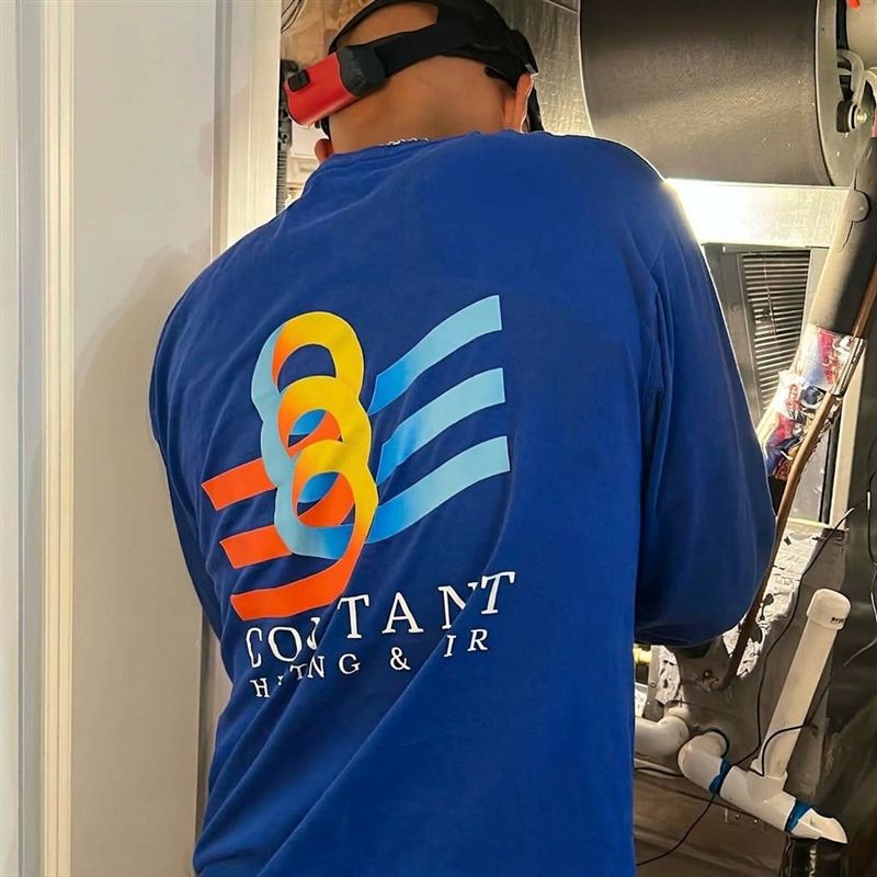 Constant technician installing a new indoor system